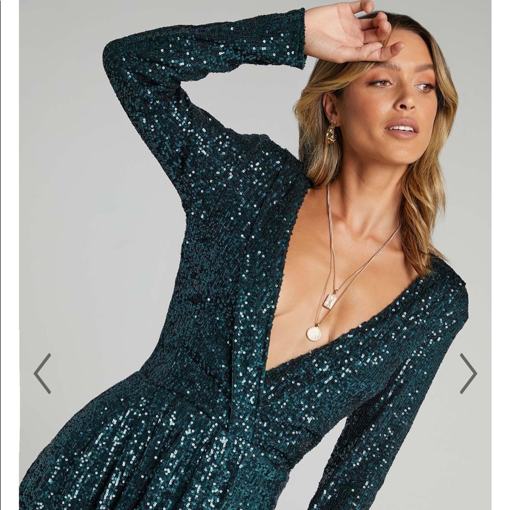 Sequin Showpo dress; low cut, shoulder pads